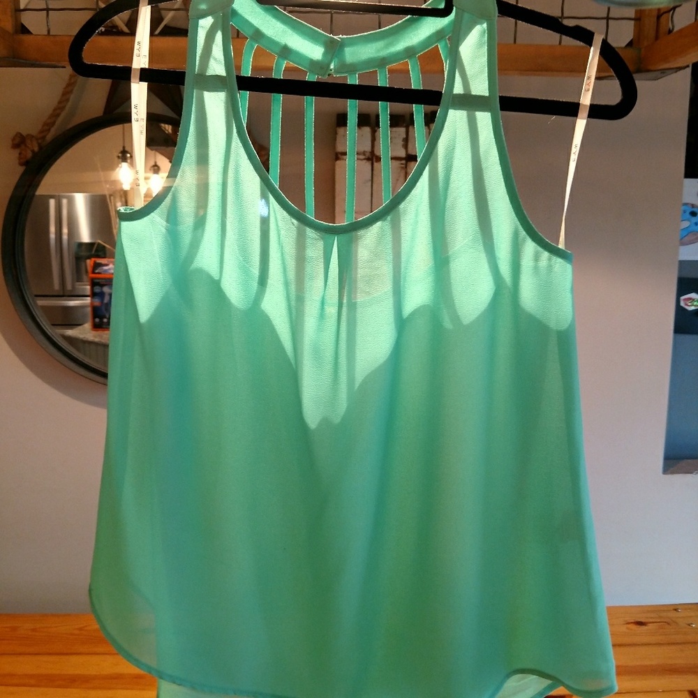Strappy back semi sheer blouse